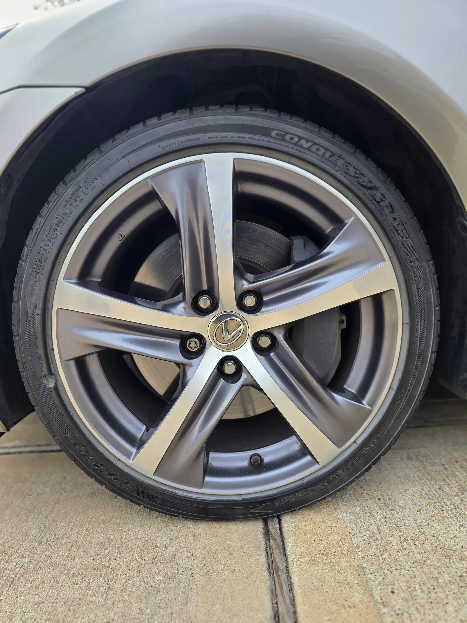 Lexus — curb rash & paint transfer, gone. — after refinishing
