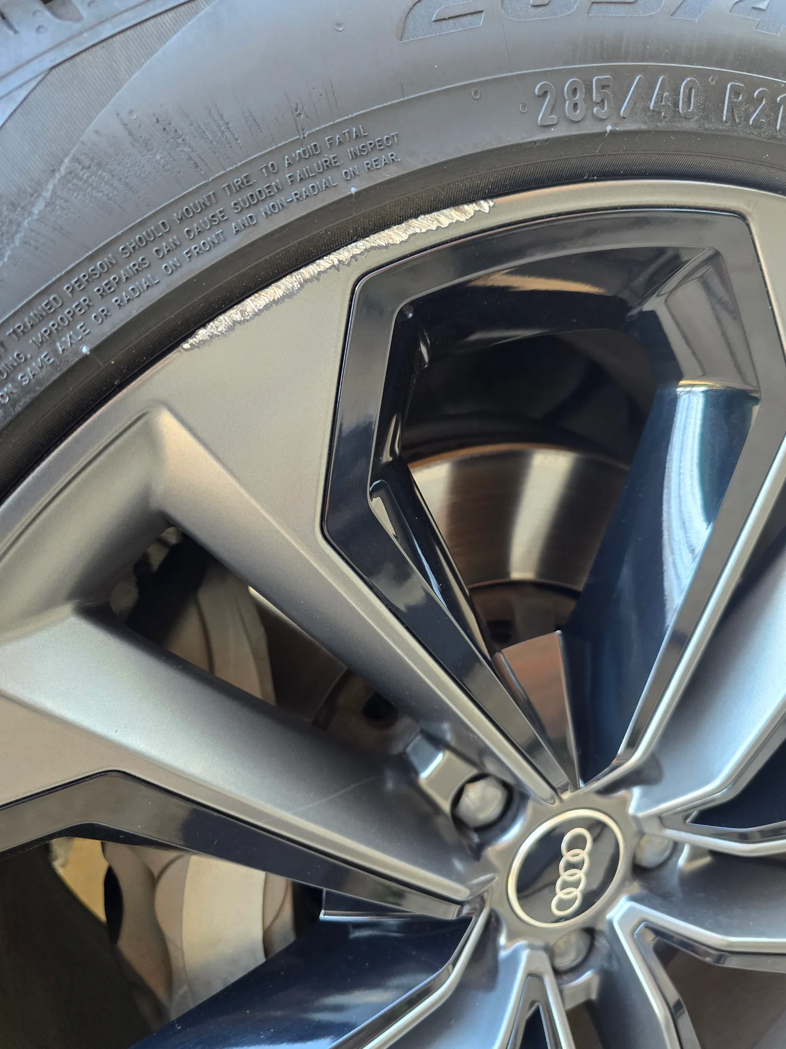 Audi 21" — gouged lip, refinished. — before refinishing