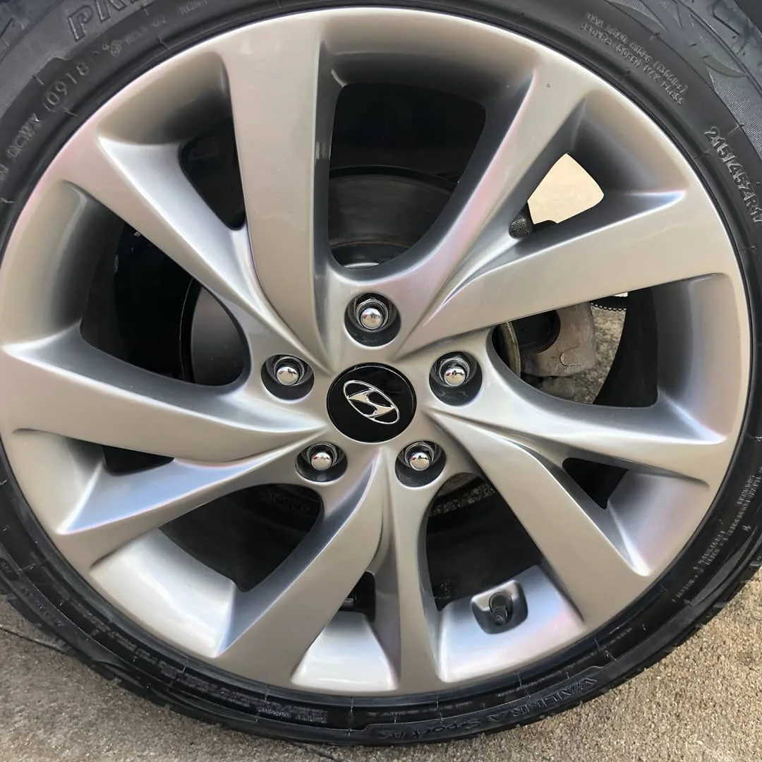 Hyundai — curb rash refinished. — after refinishing