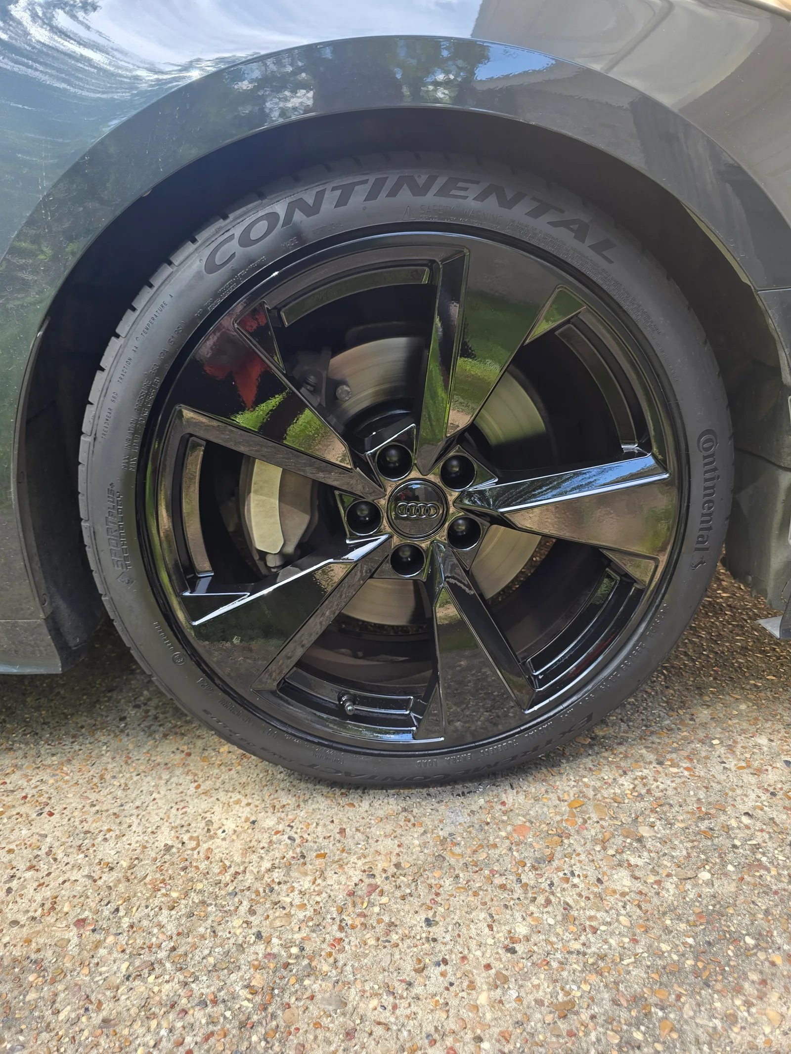 Audi — gloss black refinish.